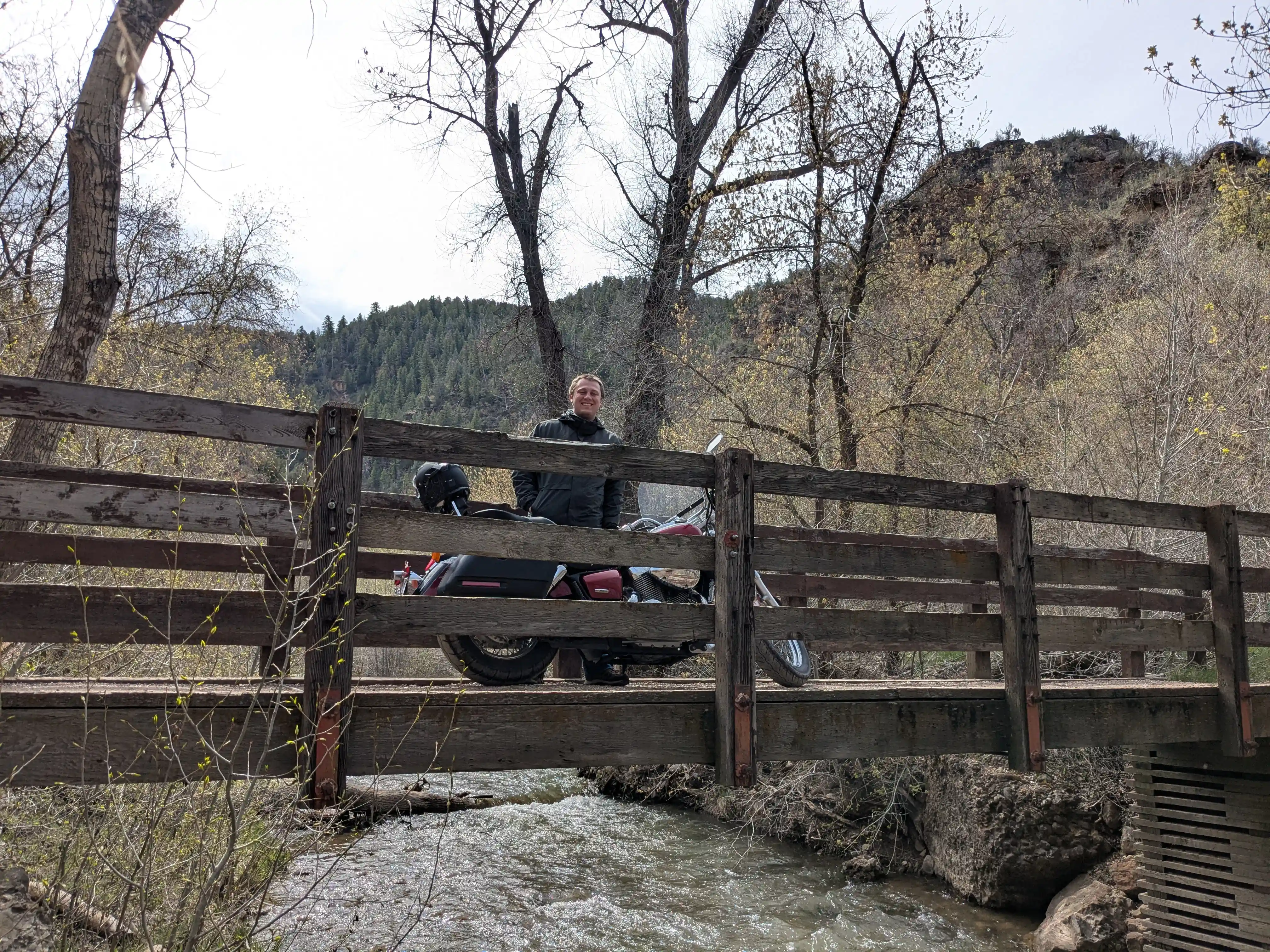 Image of me with my motorcycle on a bridge.